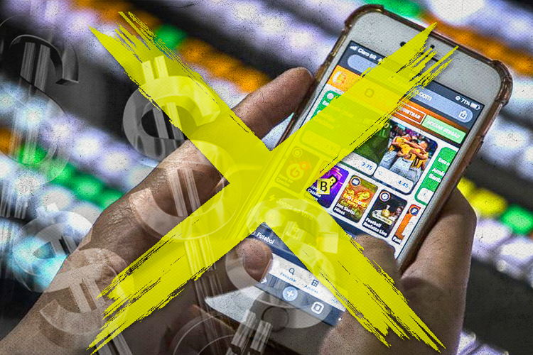 Imagem mostra um celular em aplicativo de Bets com um X grande, amarelo, para indicar a proibição